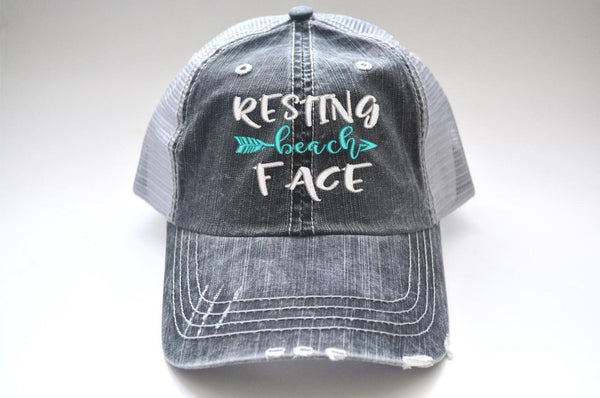 Resting Beach Face Arrow Trucker Hat